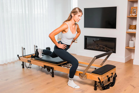 Pilates Reformer Compared to the Tower: Which Should You Choose