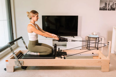 Mastering the Pilates Reformer: 7 Tips for Beginners