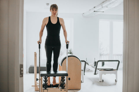 Pilates Chair vs. Reformer: Breaking Down the Differences